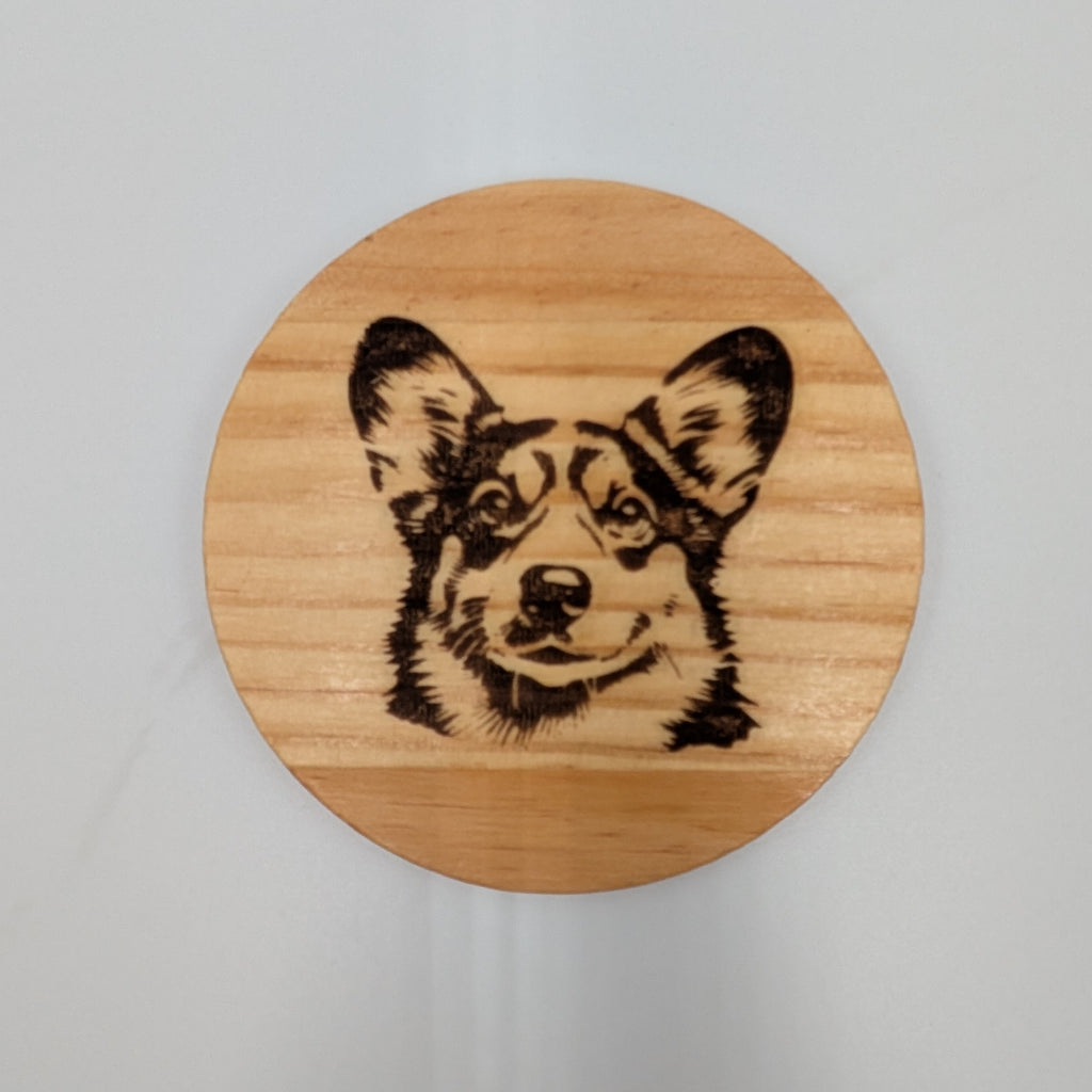 Wooden coaster with a Corgi engraving